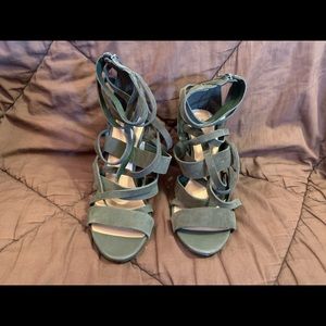 Green strappy heels with zip back